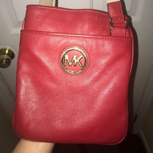 Red Michael Kohr’s purse